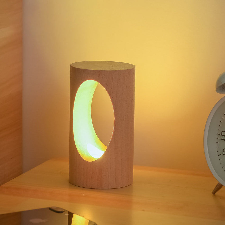 LumiGlow – Élégante lampe de table cylindrique avec découpe ovale pour un éclairage doux