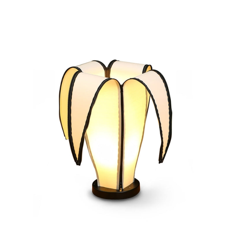 BananaGlow – Justerbar bananformet bordlampe med lynlåsdetaljer