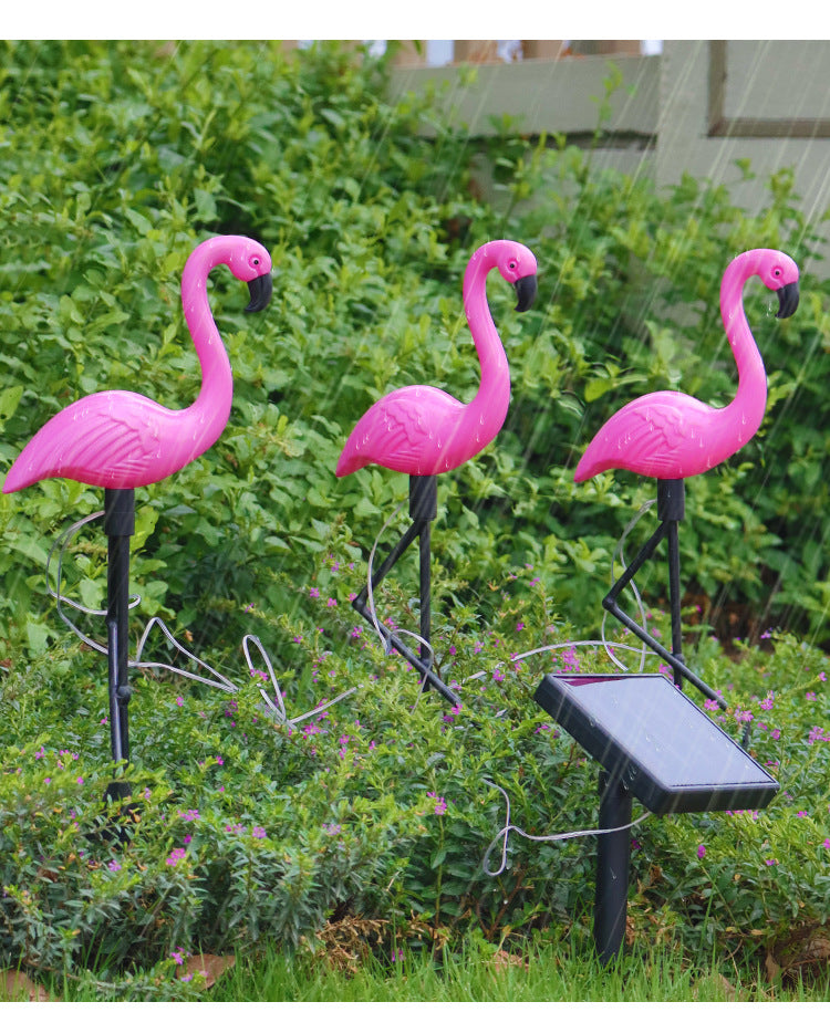 SunFlare - Charmerende flamingo-solcellelampe