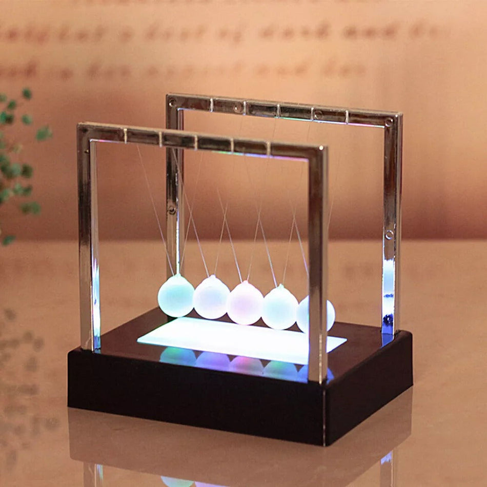 NeoMotion – Pendule de Newton LED pour mouvement hypnotique et jeu de lumière  